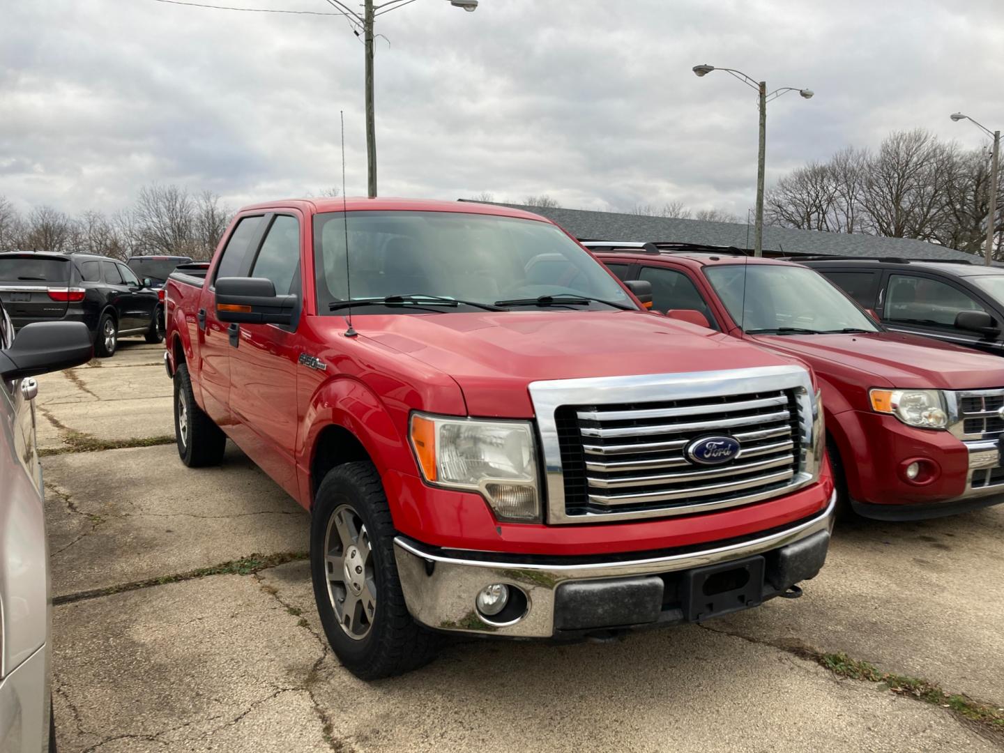 2010 Vermillion Red Ford F-150 Lariat SuperCrew 5.5-ft. Bed 4WD (1FTFW1EV9AF) with an 5.4L V8 SOHC 24V FFV engine, 4-Speed Automatic transmission, located at 1800 South Ihm Blvd, Freeport, IL, 61032, (815) 232-5543, 42.278645, -89.607994 - Photo#1